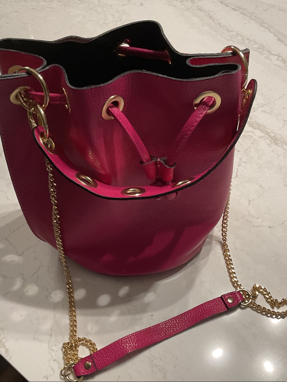 Fuchsia Leather Drawstring Bucket Bag with Gold Chain Strap